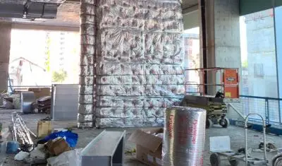 קומה בבניין בשלב בניה עם תעלות מכוסות במיגון אש של לחברת פילו אש בפרויקט של חברת החשמל